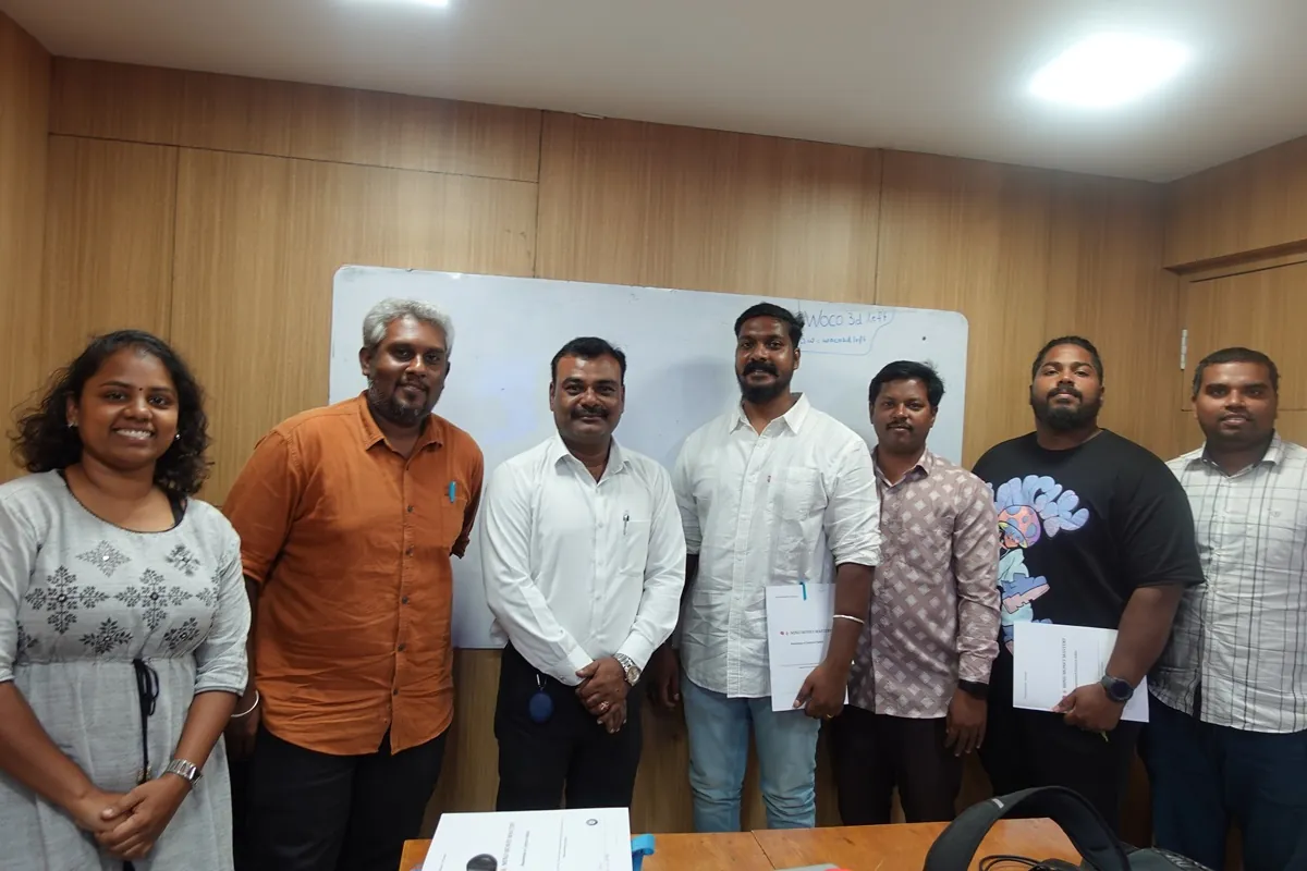 Workshop participants with their workbooks after a Samriddhi session